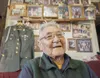 Retired Sgt. 1st Class Sam Jackson, who served in the Alaska Territorial Guard during World War II, poses for a photo inside his home in Kwethluk Sept. 23. Jackson and more than 6,300 Alaska 