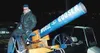 Mike Schwartz gets ready to fire a round from the Moose Gooser,
which signals a Palmer High School touchdown, field goal, extra
point or two-point conversion. Schwartz has been goosin' on the