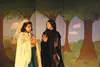 Haylee Nuñez, left, as Fiona and Isabella Dahl as Lord Farquaad, during rehearsals for Alaska Fine Arts Academy’s Shrek the Musical Jr. in Eagle River on Monday. The show debuts Friday night 