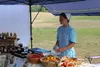 Willow Branch Farm owner Amber Byler runs a booth at the Wasilla Farmers Market Wednesday, July 6. Jacob Mann/Frontiersman