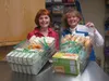 Matanuska Electric Associaiton Charitable Foundation board member Linda Menard, left, poses with Lynette Ortolano of Kids Kupboard. Menard presented Ortolano with a check for $5,000 from the 