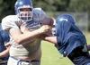 Members of the Palmer Moose varsity defense run through drills during practice Thursday afternoon at Palmer High School. Palmer faces Soldotna this weekend for the season opener. ROBERT DeBER