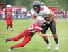 ROBERT DeBERRY/Frontiersman Wasilla senior Pat Chafin takes on
Juneau’s Lawrence Fenumiai Friday at Wasilla High School.