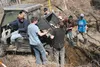 A crew led by Boy Scout Karl Greathouse work to rehabilitate a portage for canoes to access the 7-Mile Trail. The effort is Greathouse’s Eagle Scout project. ANDREW WELLNER/Frontiersman