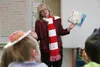 First Lady Donna Walker reads ‘The Cat in the Hat’ by Dr. Seuss to third-grade students at Machetanz Elementary School on Friday, March 4, in celebration of the author’s birthday and ‘Read Ac