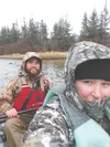 Emily and I bundled up for the chilly, wet ride down the river. The hooligan were running thick and we enjoyed watching them dart from below the raft as we floated over them. Kyle Wilkinson/F