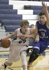 Palmer freshman Clayton Southwick tries to drive the baseline past Thunder Mountain's Jacob Calloway during a 74-71 loss to the Falcons. Southwick and Calloway combined to score 54 points in 