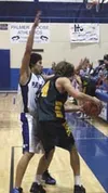 Stanley Ratcliffe puts pressure on Seward's Issiah Norton as the
Seahawk guard tries to pass the ball down the court. Photo by
JEREMIAH BARTZ/ Frontiersman.