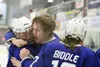 The Palmer Moose celebrate a 4-3 overtime win over Soldotna in the ASAA First National Cup Division II semifinals Friday the Menard Arena in Wasilla. Jeremiah Bartz/Frontiersman