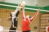 Colony’s Morgan Johnson blocks the attack of Wasilla’s Madison McRee during Friday’s game at Colony High School.