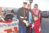 LANIER HUTCHESON/Frontiersman Alex Fenwick does his part to help
Toys for Tots by donating a toy to Pvt. Jordan Benson.