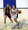 Redington’s Marian Aparezuk moves the ball up the floor during a win over Grace Christian Tuesday. Courtesy of Bruce Eggleston/matsusports.net