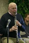 Several dozen people gathered at the Palmer Public Library
Sunday to listen to the Bill Tull &amp; Friends jazz group. The
band, which had Marty Kenney on bass and violin, Barry Johnson on
dr