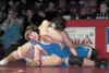 Palmer’s Ben Button takes on Wasilla’s Austine Gonzales during
the finals at the North/South Invitational at Wasilla High
School. ROBERT DeBERRY/Frontiersman