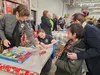 Brenda Gregory and her grandson Tuli Maea get help wrapping presents. Jacob Mann/For the Frontiersman