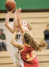 ROBERT DeBERRY/Frontiersman Junior post Alex Coon grabs the
rebound and puts it back up for two points during Friday's game
against the West Valley Wolf Pack at Colony High School.