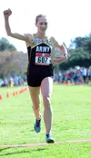 Army Maj. Kelly Calway crosses the finish line of the Armed Forces Cross Country Championship at Mission Bay Park in San Diego, Jan. 18, 2019, to finish fifth with a time of 40:31. Gary Sheft