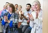Members of the audience applaud during the Mat-Su Recovery Services presentation June 14 in Wasilla. Multiple organizations are coming together to help expand the overall ‘continuum of care’ 