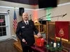 Kevin Bottjen stands with a Red Kettle at the Salvation Army Mat-Su Valley Corps chapel in Palmer. Jacob Mann/Frontiersman