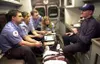 Valley paramedics-in-training, from left, John Beebe, Heather
French, Cameron Carter and Cami Zobel are instructed in emergency
care techniques by Chris McAleer, a firefighter in Dearborn, Mi