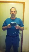 Richard Hartman poses with the Left Ventricle Assist Device keeping him alive. Hartman is on the waiting list for a new heart and in the meantime has racked up expenses his family is having t