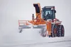 A snowplow removes snow from the Palmer Airport following a storm in 2013. Frontiersman file photo/Robert DeBerry