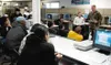 U.S. Army Sgt. Jay DeFillipo talks to Alaska Job Corps students
Saturday at the Job Corps Center in Palmer. DeFillipo hosted a
computer game tournament of the Army's team-based combat game,
A