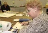 GREG JOHNSON/Frontiersman Palmer resident Peggy Compton usually
works with oil paints, but for Monday’s Paint-Together at Mat-Su
College, she uses watercolor pencils and iridescent watercolor