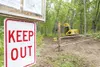 ROBERT DeBERRY/Frontiersman A “keep out” sign and locked gate
block the entrance to Usibelli Coal Mine’s Wishbone Hill access
road near Mile 55.5 Glenn Highway. The Mat-Su Borough voted Tuesd