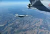 221017-N-N0777-1001 LITHUANIA (Oct. 17, 2022) A French Airbus A330 MRTT refuels an F/A-18F Super Hornet, attached to Strike Fighter Squadron (VFA) 103, during the NATO-led vigilance activity 