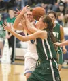 Palmer’s Leya DePriest battles Colony’s Faith Farris for the ball during the Knights 59-33 victory Friday at Palmer High School. ROBERT DeBERRY/Frontiersman.com