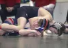 Wasilla's Tyler Adams grapples with North Pole's Dalton Barrie
during Friday's semi-final round at the ASAA/First National Bank 4A
State Wrestling Championships at the Curtis D. Menard Memori