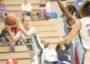 ROBERT DeBERRY/Frontiersman Colony Knight Andi Lund looks to
pass the ball to Kysha Mallo as East High Thunderbird Jazmine Scott
tries to block.