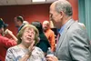 Palmer businesswoman Janet Kincaid talks with Gov. Bill Walker Friday during a ‘Building a Sustainable Future for Alaska’ at the Curtis D. Menard Memoria Sports Center in Wasilla. HEATHER A. 
