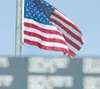 ROBERT DeBERRY/Frontiersman file The American flag flies over
the Veterans’ Wall of Honor in Wasilla.