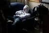 A teen leadership student tries to catch some extra sleep during class the day after the leadership campout to raise awareness of homeless teens. Students described the day after as exhaustin