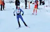 Photo courtesy of Russ Dunlap Palmer senior Duney Strickland
races ahead of a West Valley skier during the Valdez Invitational
cross-country ski meet in Valdez last week. Strickland won the
8
