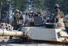 U.S. Army 2nd Lt. Tatiana Miranda (right), third platoon leader with Alpha Company, 2nd Battalion, 34th Armored Regiment, 1st Armored Brigade Combat Team, 1st Infantry Division, prepares for 