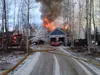 Firefighters were called to this home on Coal Road in Meadow Lakes in February of 2016 for a house fire. On Sunday, June 5, 2016, Alaska State Troopers found two people dead inside another bu