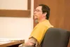 ROBERT DeBERRY/Frontiersman Brett Talmadge, 37, listens to his
attorney during a sentencing hearing Monday in Palmer.