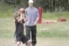 JEREMIAH BARTZ/Frontiersman Former Colony High football standout
Rhett Magner coaches a young wide receiver during a youth football
skills camp at the AT&amp;T Sports Center Monday morning. M