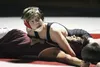 Wasilla's Micah Mathis works to pin Ketchikan's Vince Tenebro during a dual with the Kings Nov. 19 at Wasilla High School. The Warriors won the dual 54-24. Mathis recorded a first-round pin o