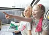 ROBERT DeBERRY/Frontiersman Aleksandra Kvalheim, 6, left, and
Kaitlyn Smith, 6, look out of the observatory car windows of an
Alaska Railroad train during a class field trip and tour on
Thurs