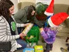 Credit Union 1 staff visit with seniors and children at WASI during Giving Tuesday, Dec. 3. Courtesy photo.