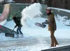 Brandon Johnson, right, tosses a shovelful of snow off the Wasilla skate park on Friday. Despite temperatures in the low teens, Johnson said working to make the park skateable beat the altern
