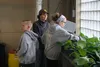 Attendee, Samantha Rice with her children Abri and Jade select a cabbage starter. She teaches a garden program at Dena’ina Elementary School and is helping to kick off the school’s first gard