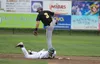 Mat-Su catcher Ryan Haug slides back into second base as Anchorage infielder Cody Sporrer reaches up for a high throw during Anchorage's 6-2 win over the Miners. Jeremiah Bartz/Frontiersman