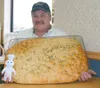 ROBERT DeBERRY/Frontiersman file photo Gary Young turned his
passion for baking into a full-time job. His North Start Bakery in
Wasilla marks its fifth anniversary this week.