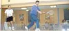 As the gallery watches, Anchorage pro Bob Landau, right, volleys
with Mark Alger, who built Moosewood Squash Centre beside his home.
Below left, Alger hits a ball against the front wall. The 