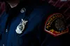 A United States Air Force Fire Protection badge is shown during a shift change on Andersen Air Force Base, Guam, April 12, 2021. Civilian firefighters changed their badges from Joint Region M